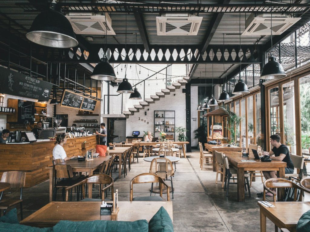 Refurbished café interior with wooden tables