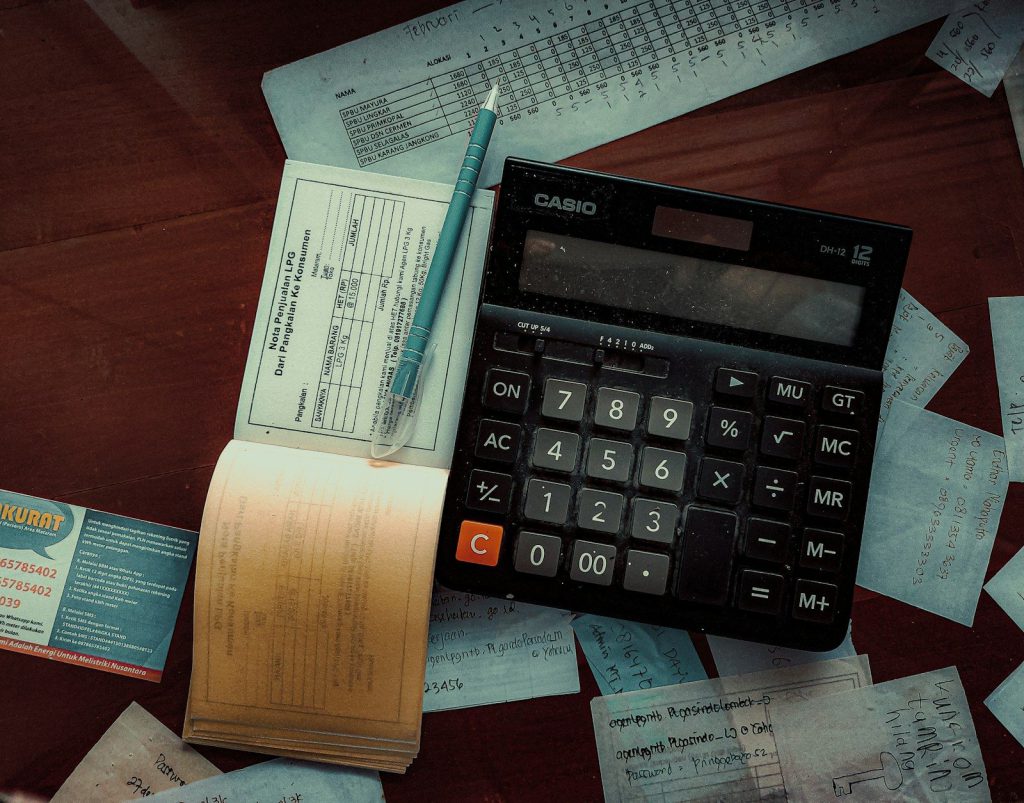 Calculator and receipts on a desk